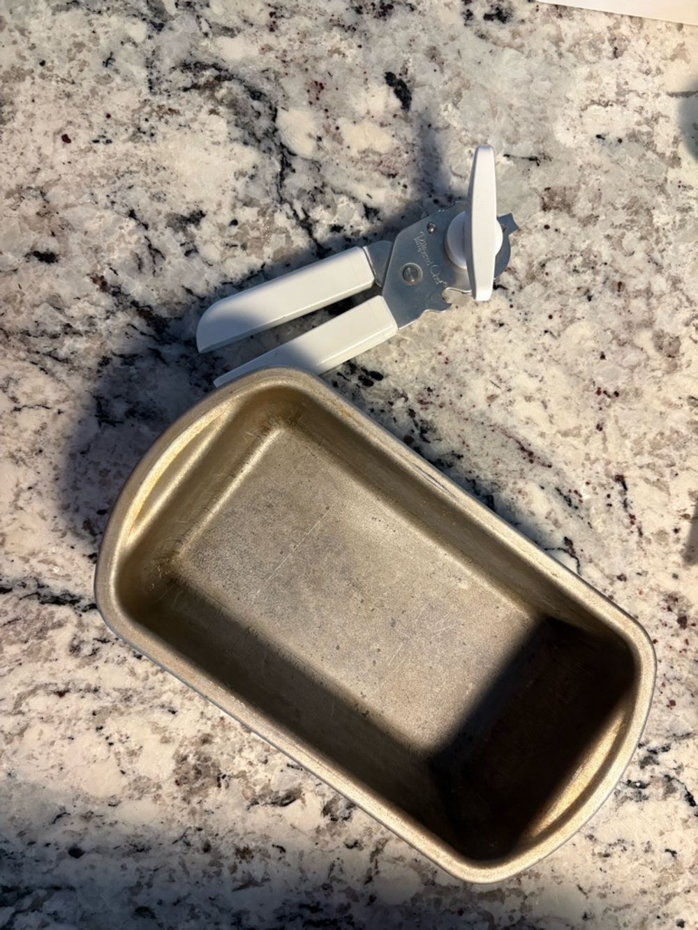 The Pampered Chef White Handheld Can Opener and Loaf Pan